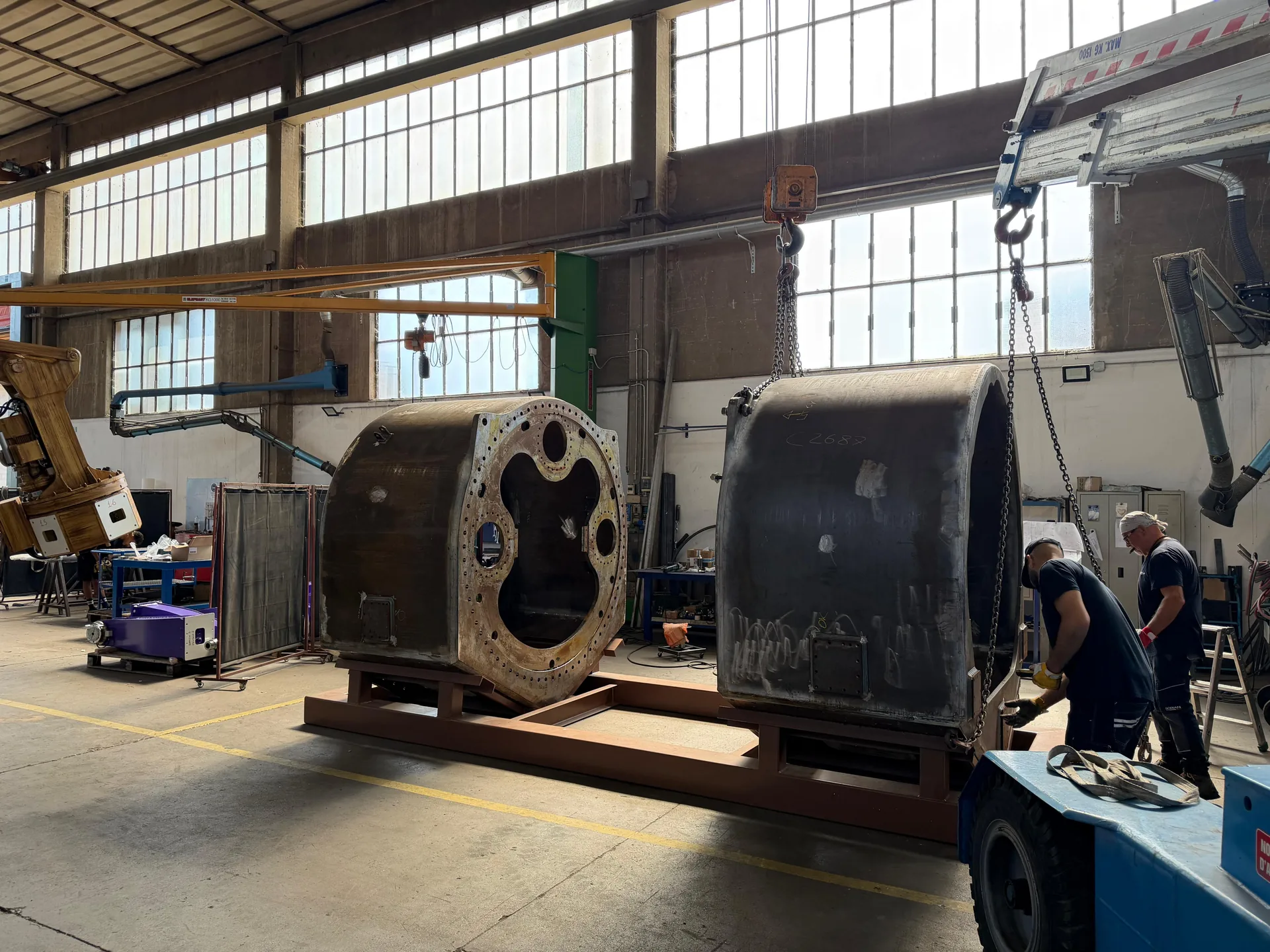Large steel structures being handled inside the Soriani production facility