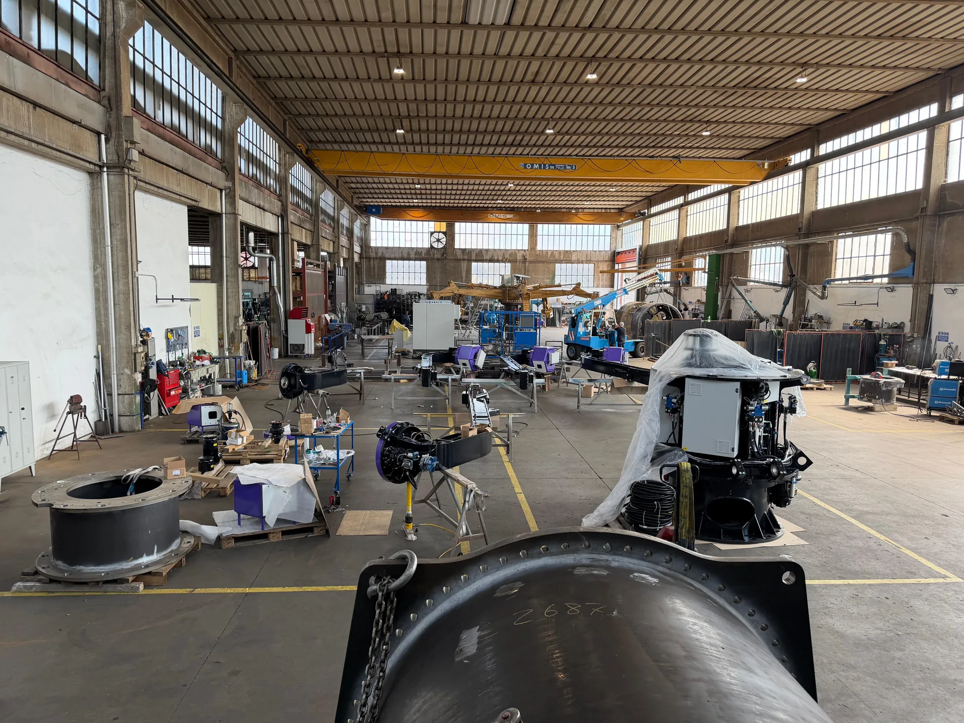 Overview of the Soriani workshop with multiple ride components in production